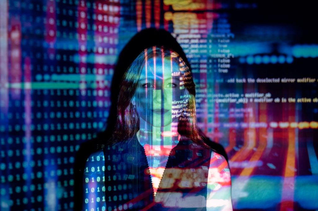 Person lit by projected data representing AI search